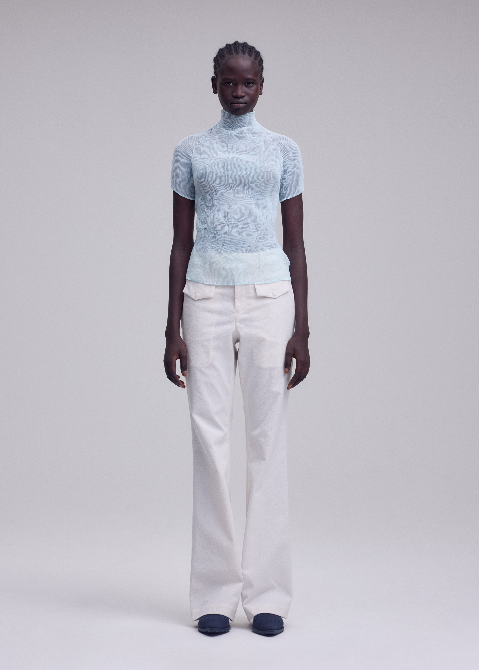 A model wears the ISSEY MIYAKE CHIFFON TWIST 1 chiffon-twist-1-shirt-dark-navy-2.