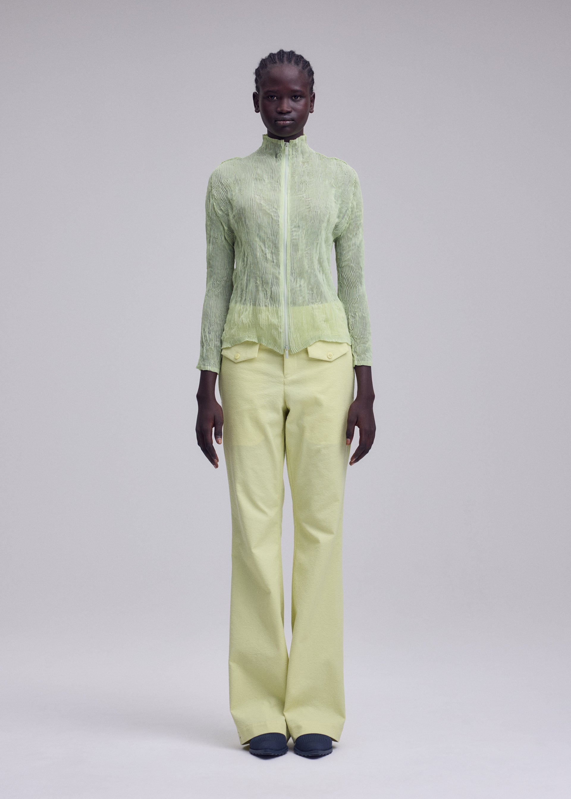 A model wears the ISSEY MIYAKE CHIFFON TWIST 1 chiffon-twist-1-shirt-1dark-navy-0.