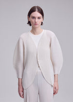 A model wears the ISSEY MIYAKE LEAF PLEATS leaf-pleats-cardigan-off-white.