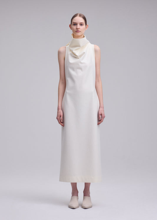 A model wears the ISSEY MIYAKE SHELL dress.