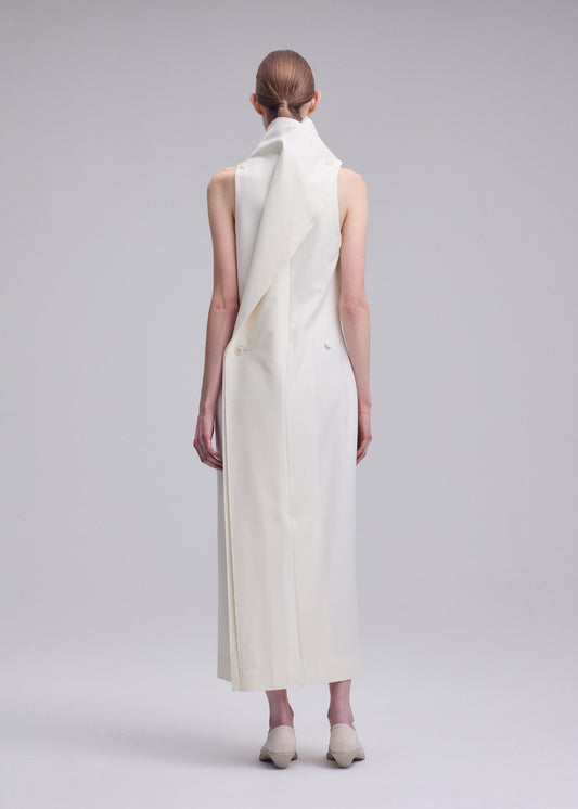 A model wears the ISSEY MIYAKE SHELL dress.