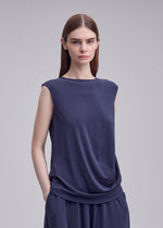 A model wears the ISSEY MIYAKE DRAPE JERSEY-68 drape-jersey-68-shirt-black-1.