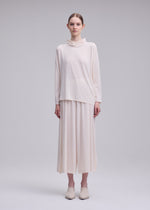 A model wears the ISSEY MIYAKE DRAPE JERSEY-68 drape-jersey-68-shirt-black-4.