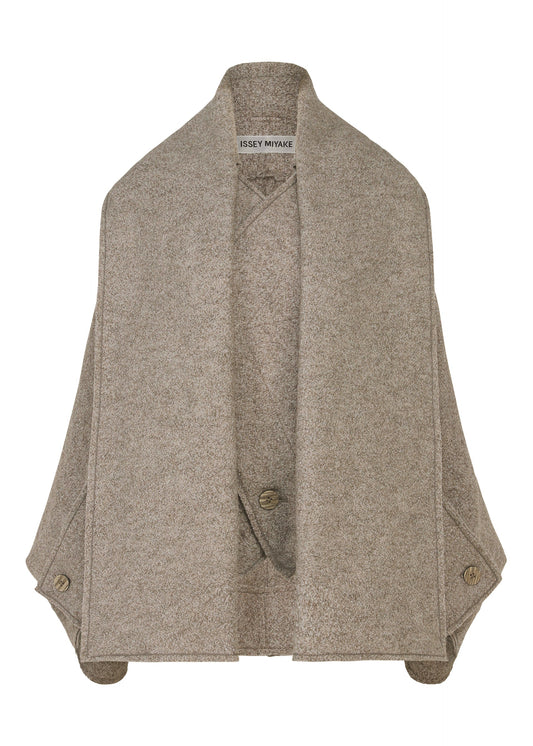 A product shot of the ISSEY MIYAKE WOOLEN GRANITE coat in beige.