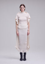 A model wears the ISSEY MIYAKE PRANCE prance-skirt-navy.