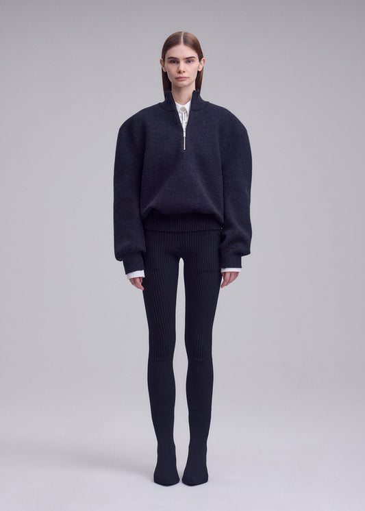 A model wears the ISSEY MIYAKE HANDSOME KNIT handsome-knit-top-grey-1.