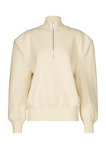 A product shot of the ISSEY MIYAKE HANDSOME KNIT top in off-white.