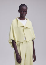 A model wears the ISSEY MIYAKE CAMPAGNE campagne-cardigan-black-8.