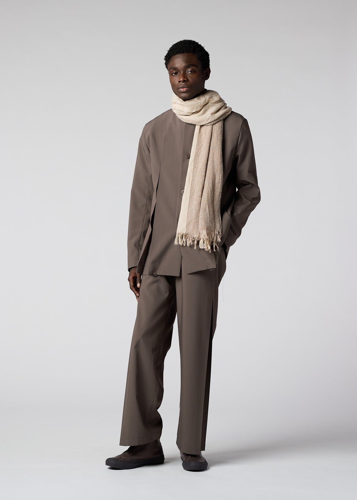 A model wears the IM MEN DOUBLE WEAVE STOLE stole.
