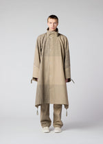 A model wears the IM MEN KASURI coat.