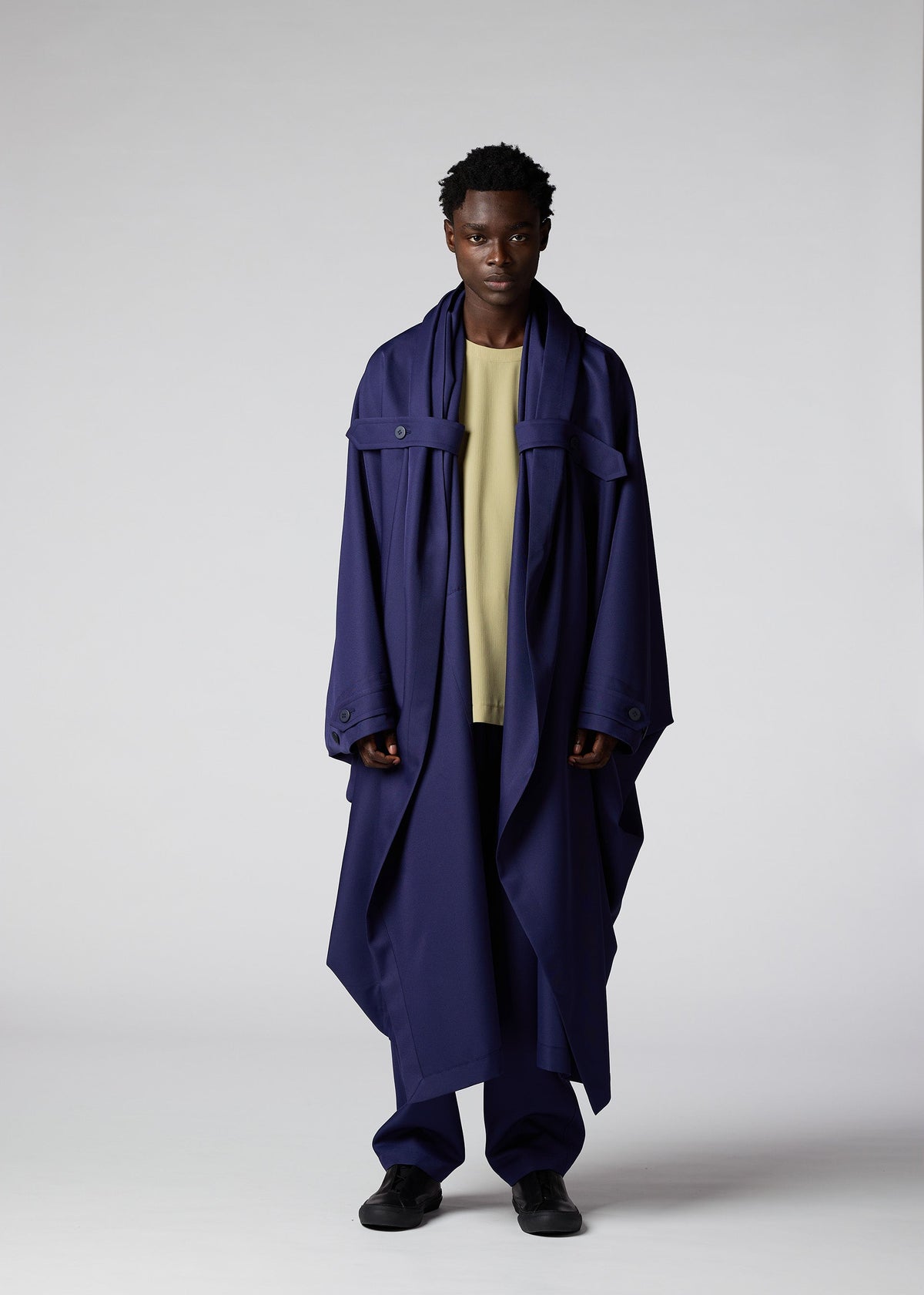 A model wears the IM Men COCOON coat.