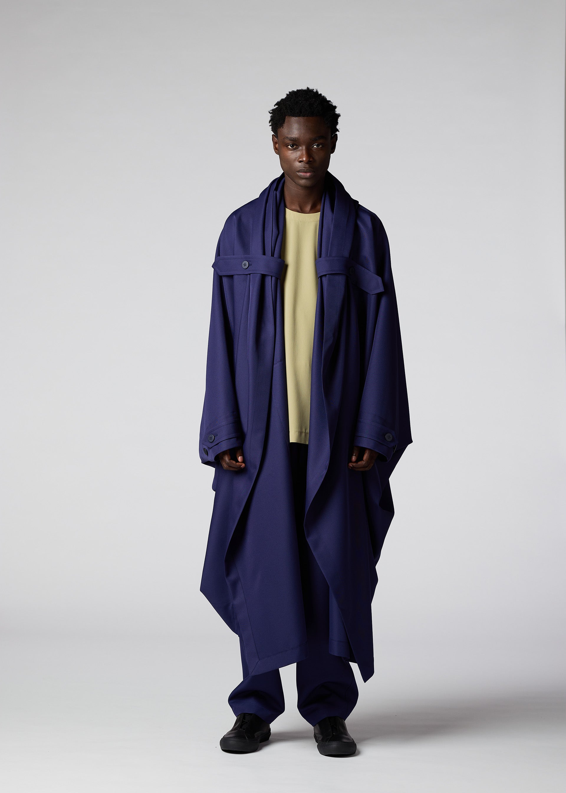 A model wears the IM Men COCOON coat.