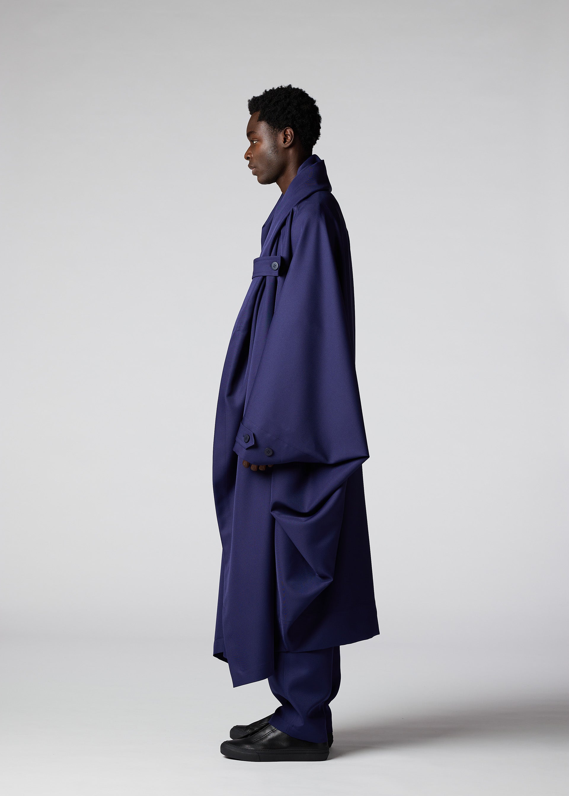 A model wears the IM Men COCOON coat.