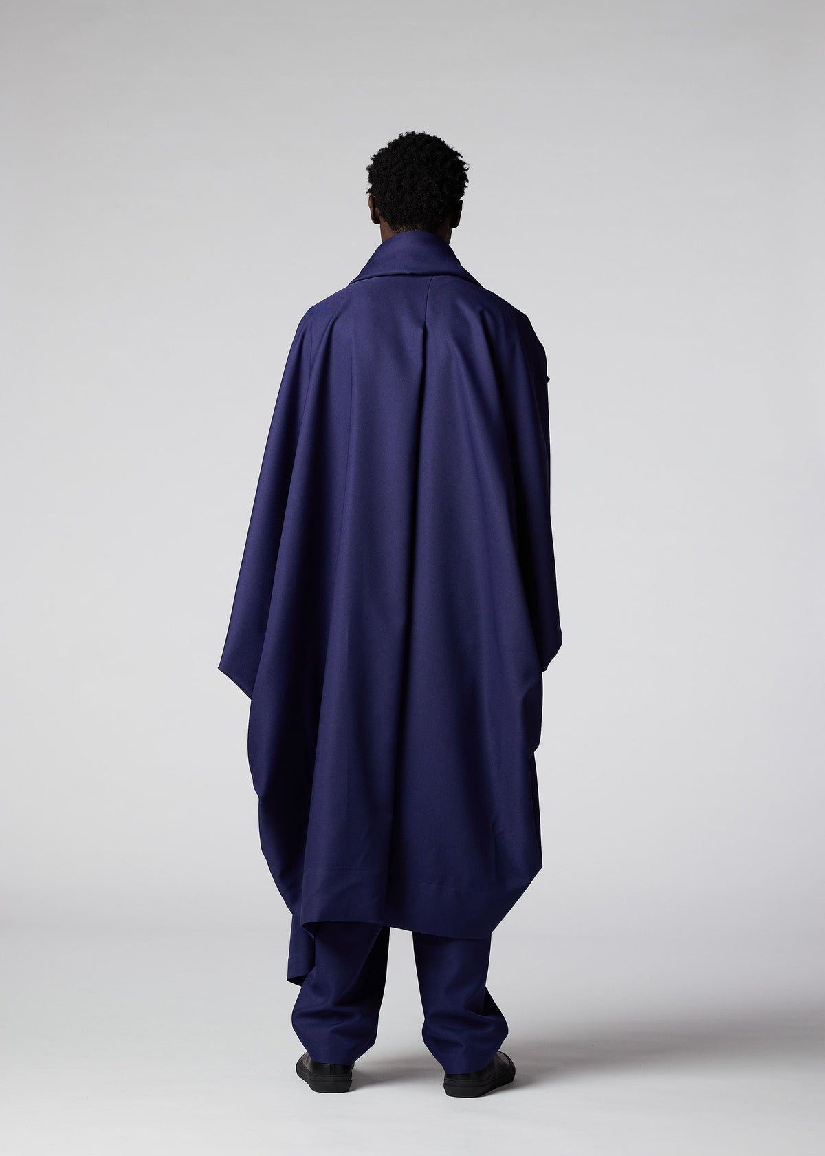 A model wears the IM Men COCOON coat.