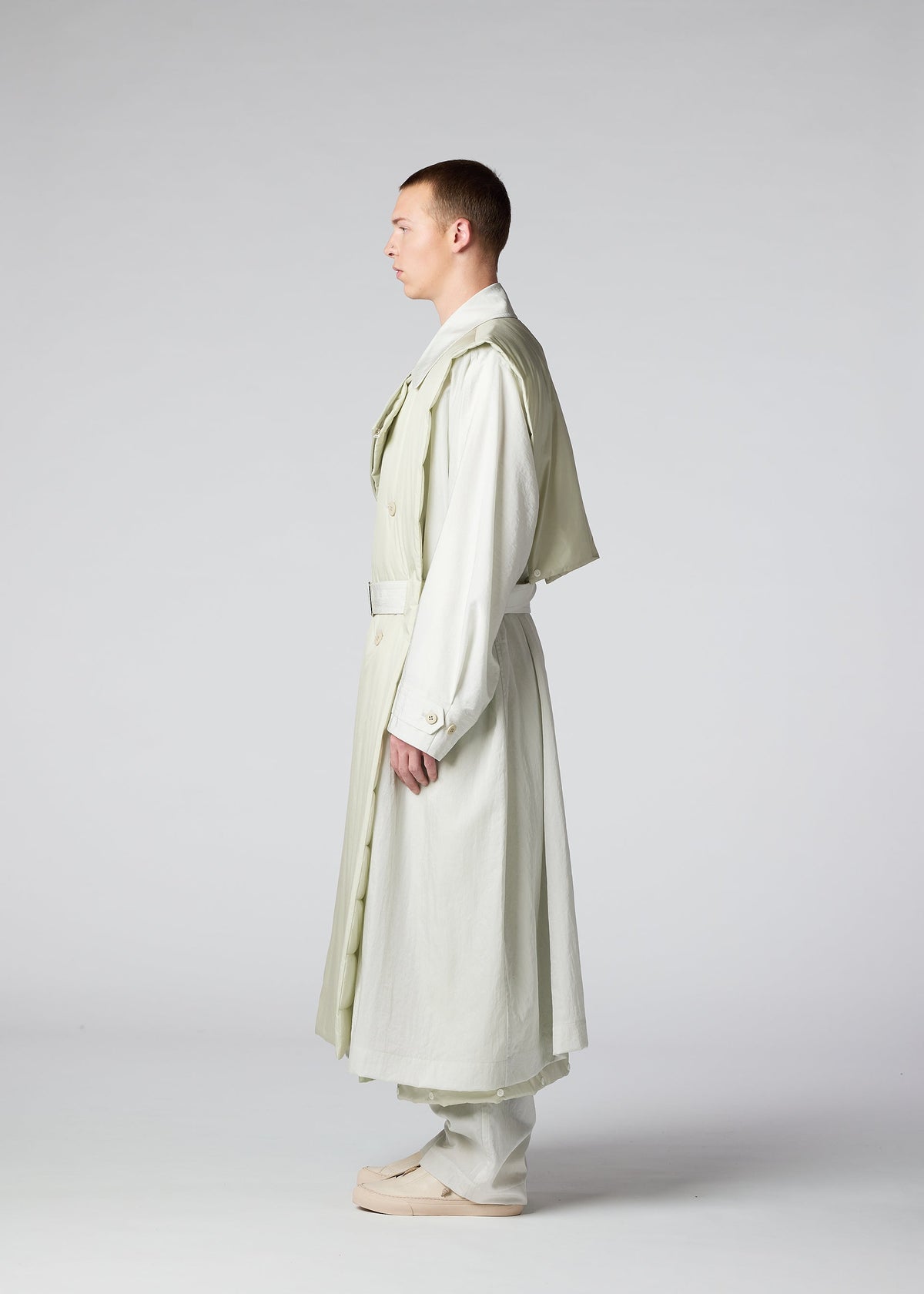 A model wears the IM Men SWITCH coat.