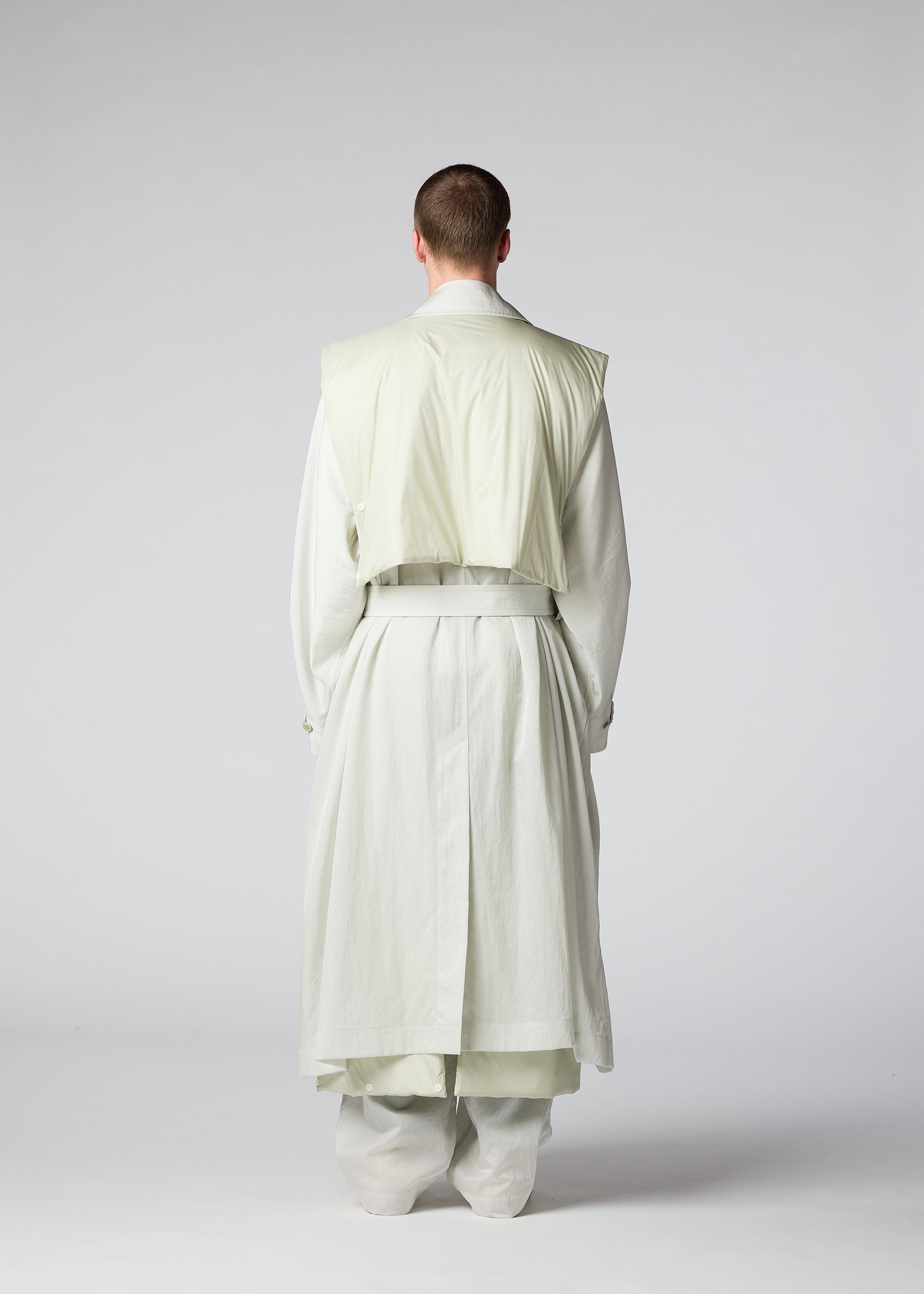 A model wears the IM MEN SWITCH coat.