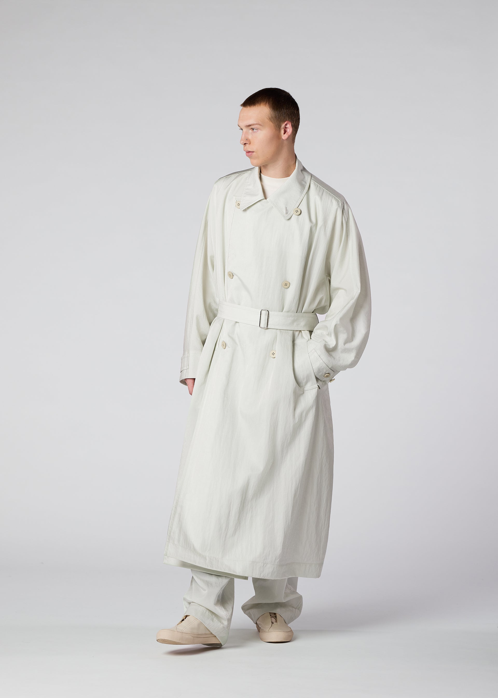 A model wears the IM Men SWITCH coat.