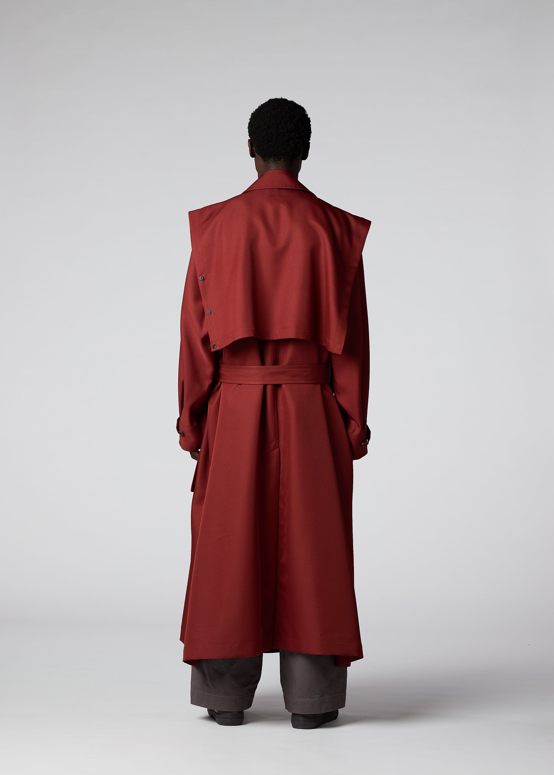 A model wears the IM Men WALL coat.