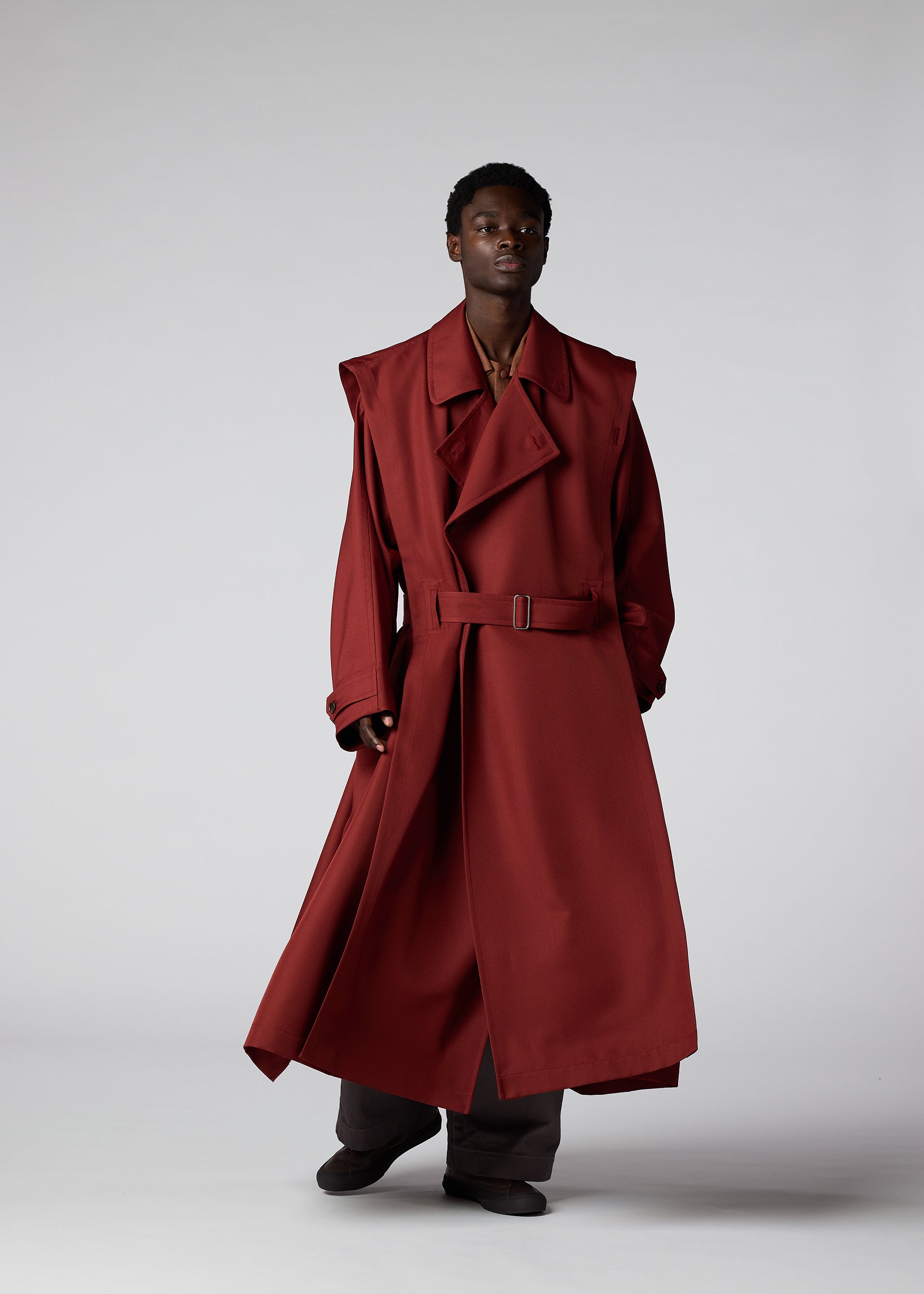 A model wears the IM Men WALL coat.