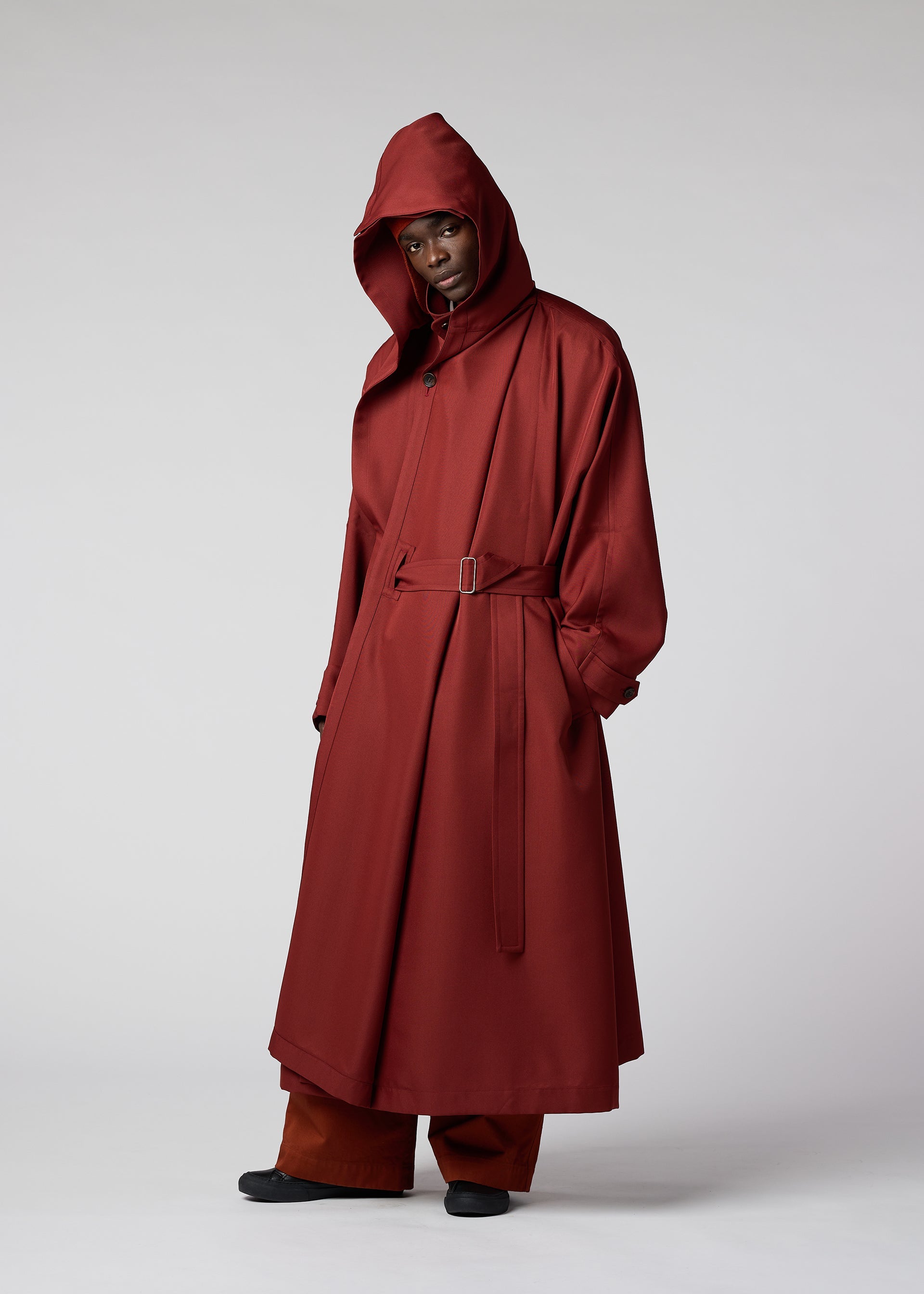 A model wears the IM Men WALL coat.