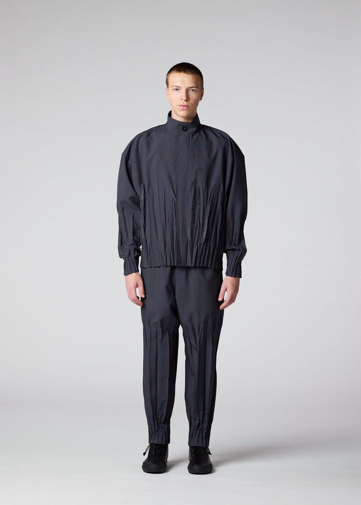 A model wears the IM MEN WAFT jacket.