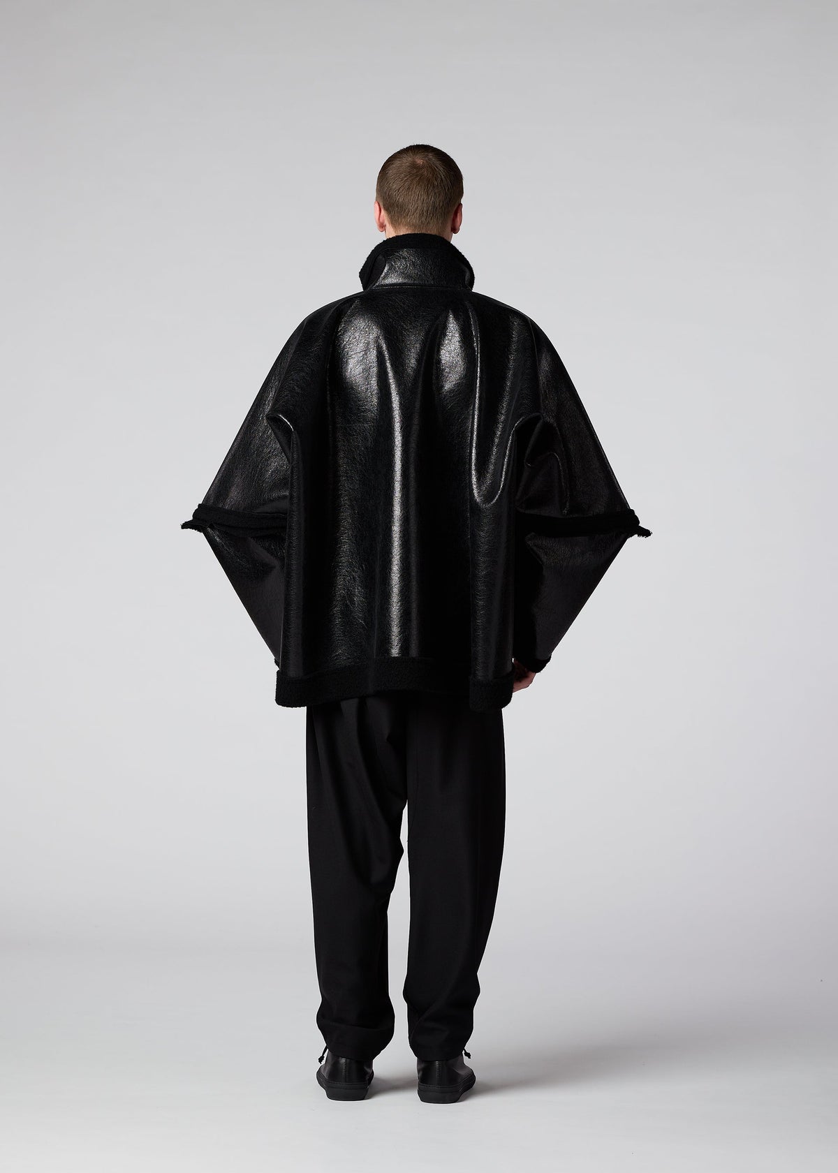 A model wears the IM Men METALLIC ULTRA BOA prêt à porter.