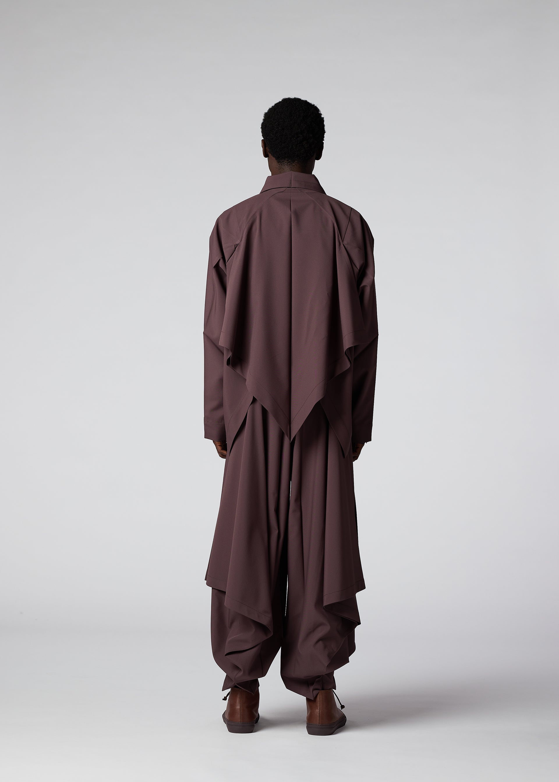 A model wears the IM Men FLAT DRAPE prêt à porter.