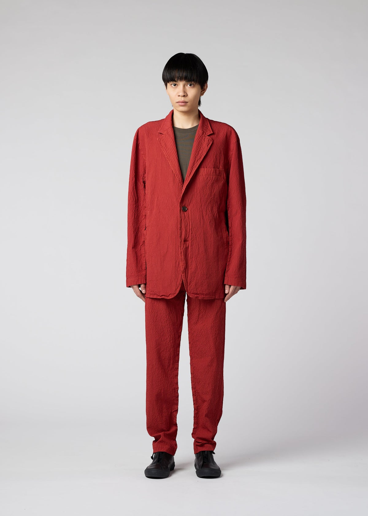 A model wears the IM MEN SHRINK DYE jacket.