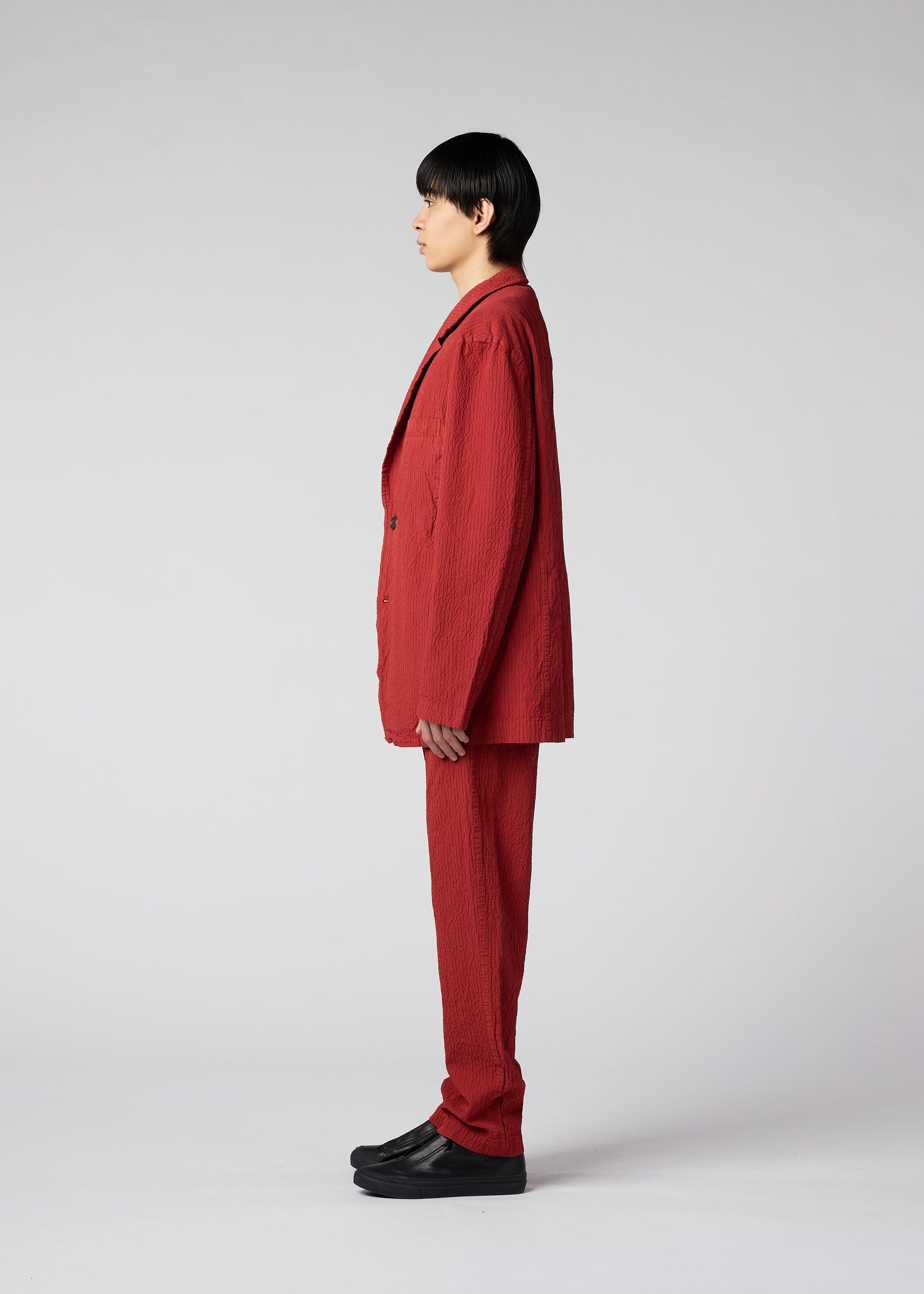 A model wears the IM MEN SHRINK DYE jacket.