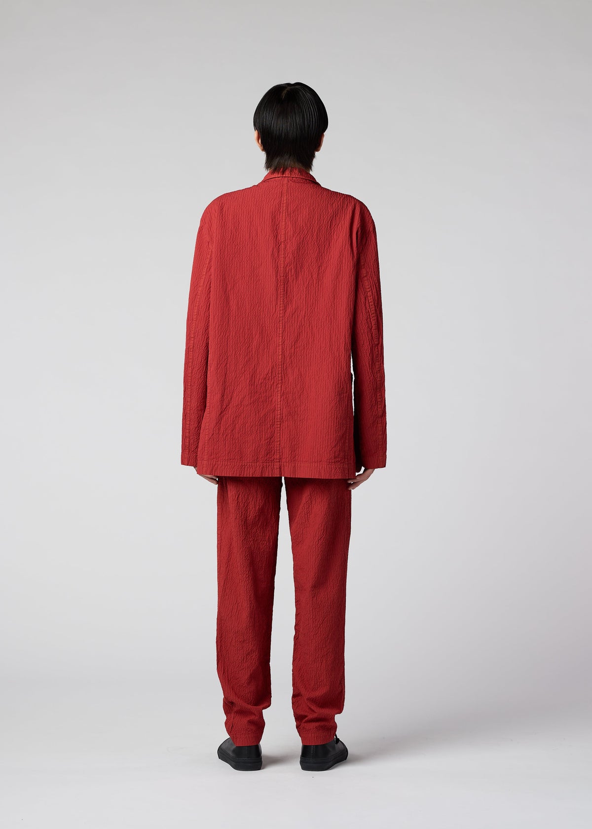 A model wears the IM MEN SHRINK DYE jacket.