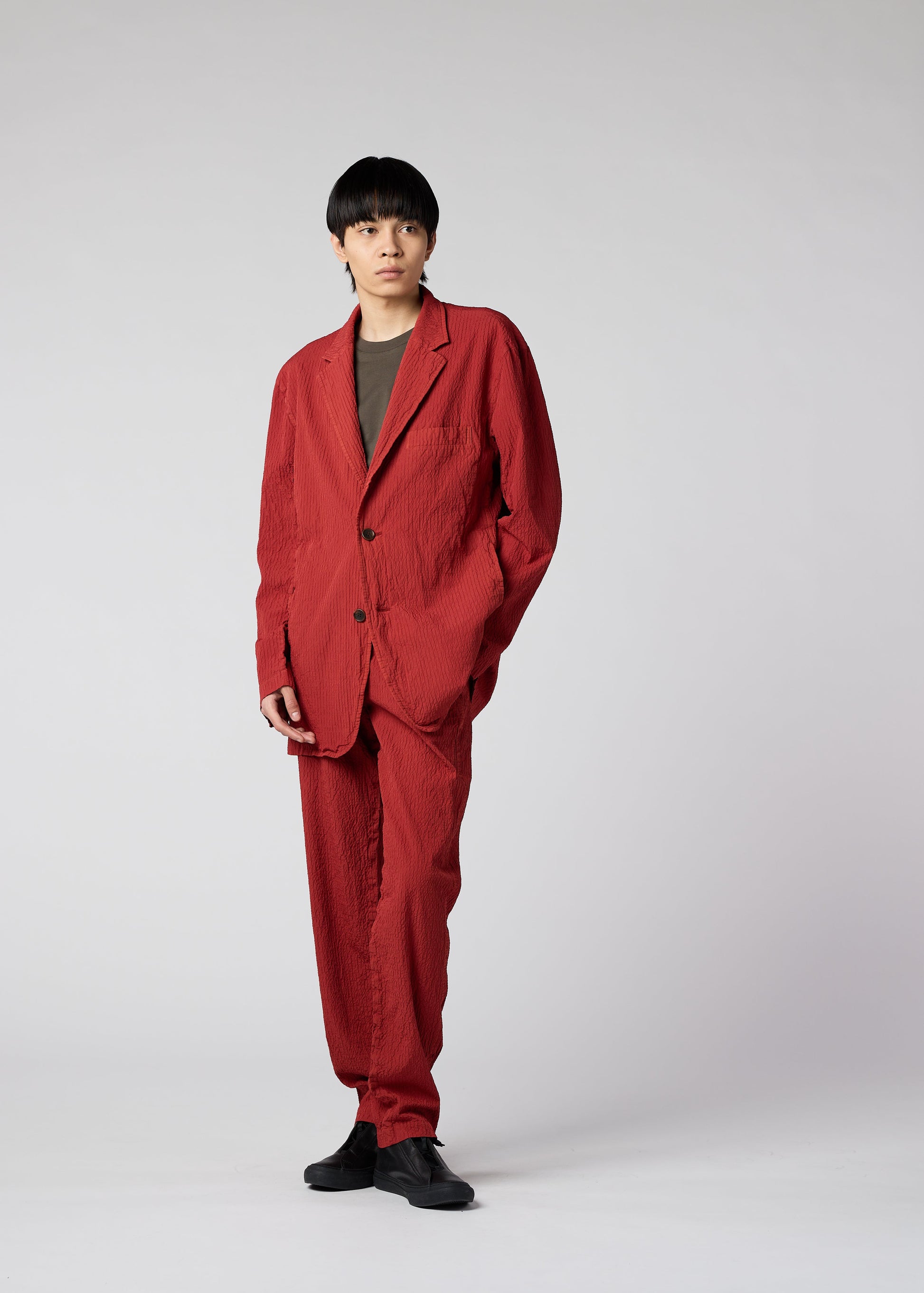 A model wears the IM MEN SHRINK DYE jacket.