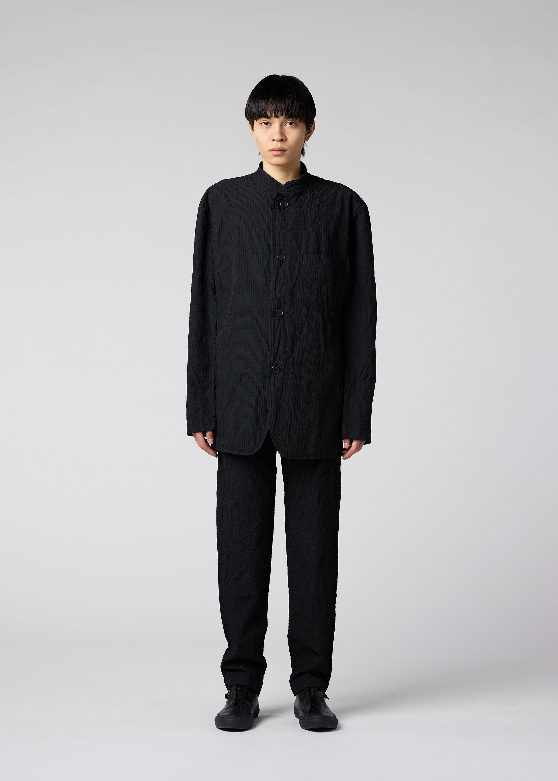 A model wears the IM MEN SHRINK DYE jacket.