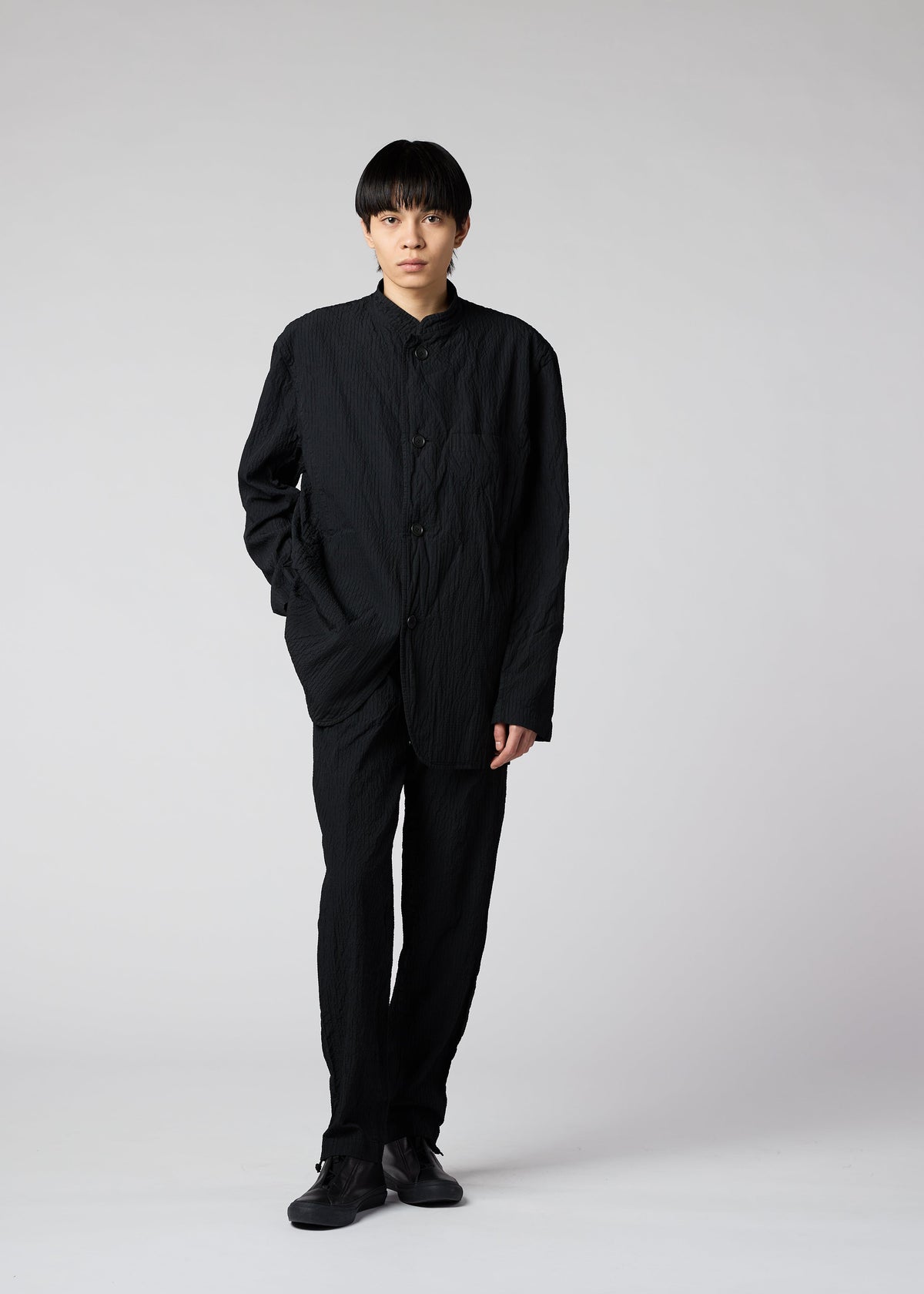 A model wears the IM MEN SHRINK DYE jacket.