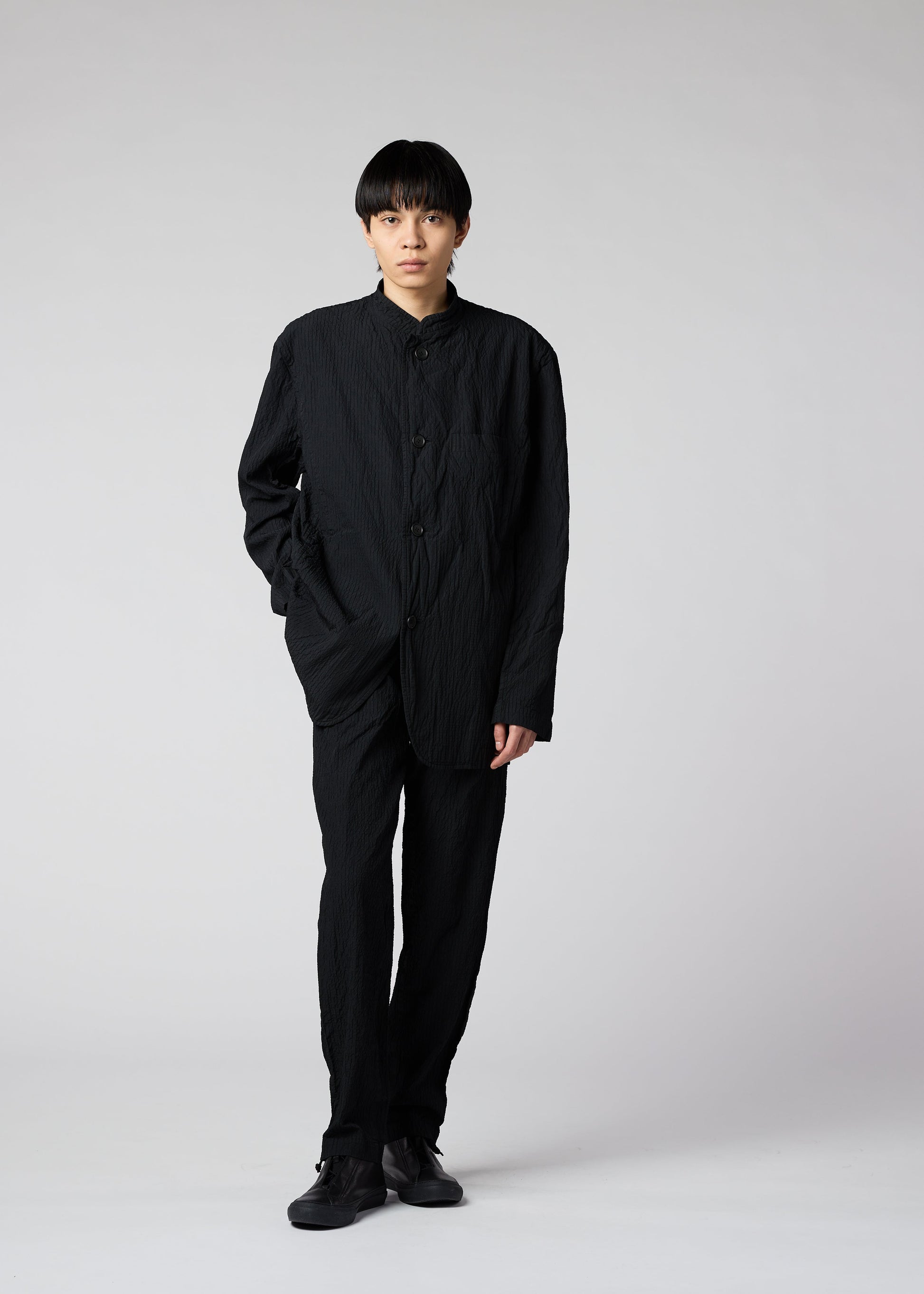 A model wears the IM MEN SHRINK DYE jacket.