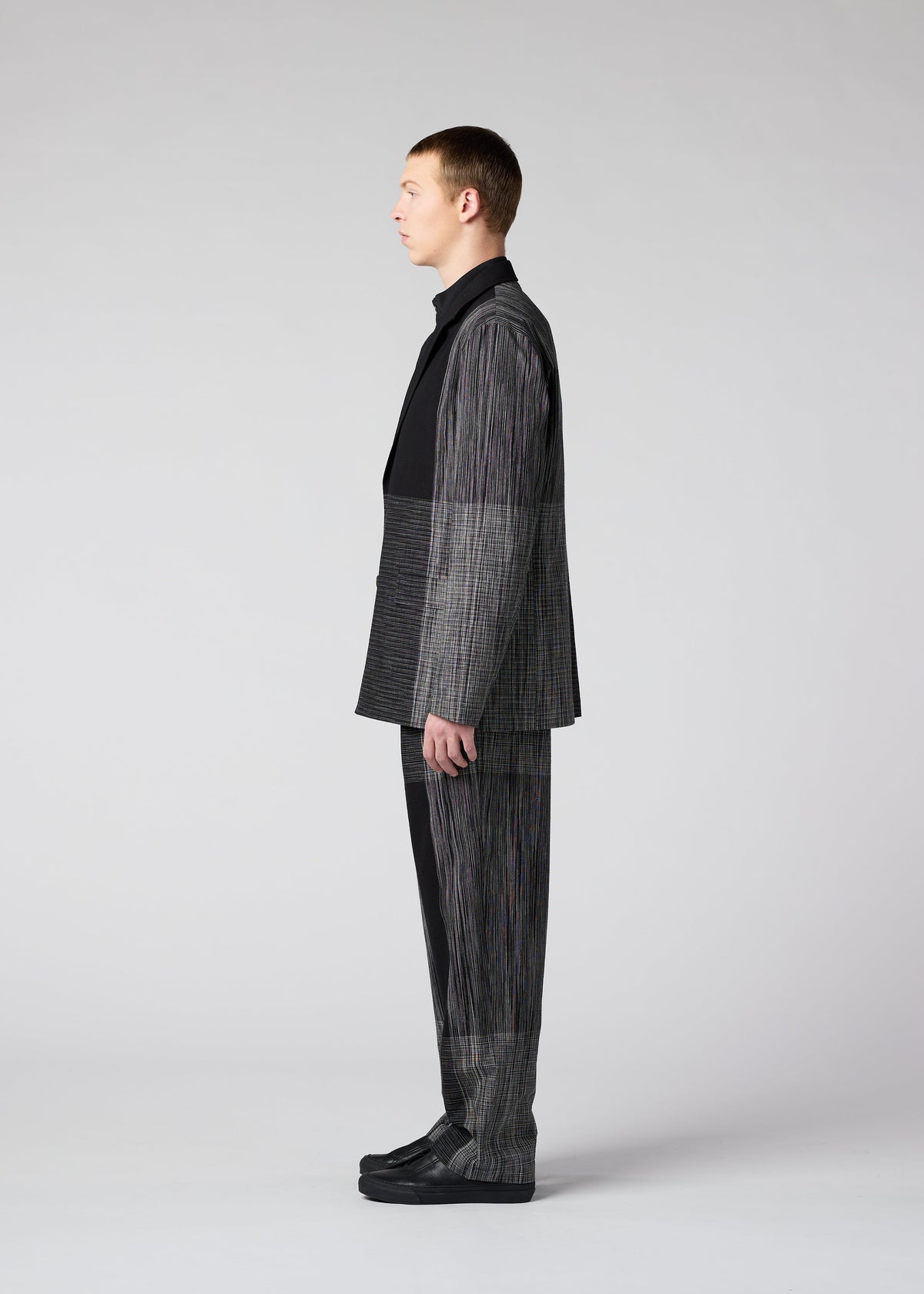 A model wears the IM MEN KASURI jacket.