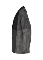 A detail shot of the IM MEN KASURI jacket.