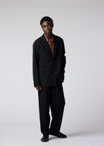 A model wears the IM MEN FLY WOOL jacket.