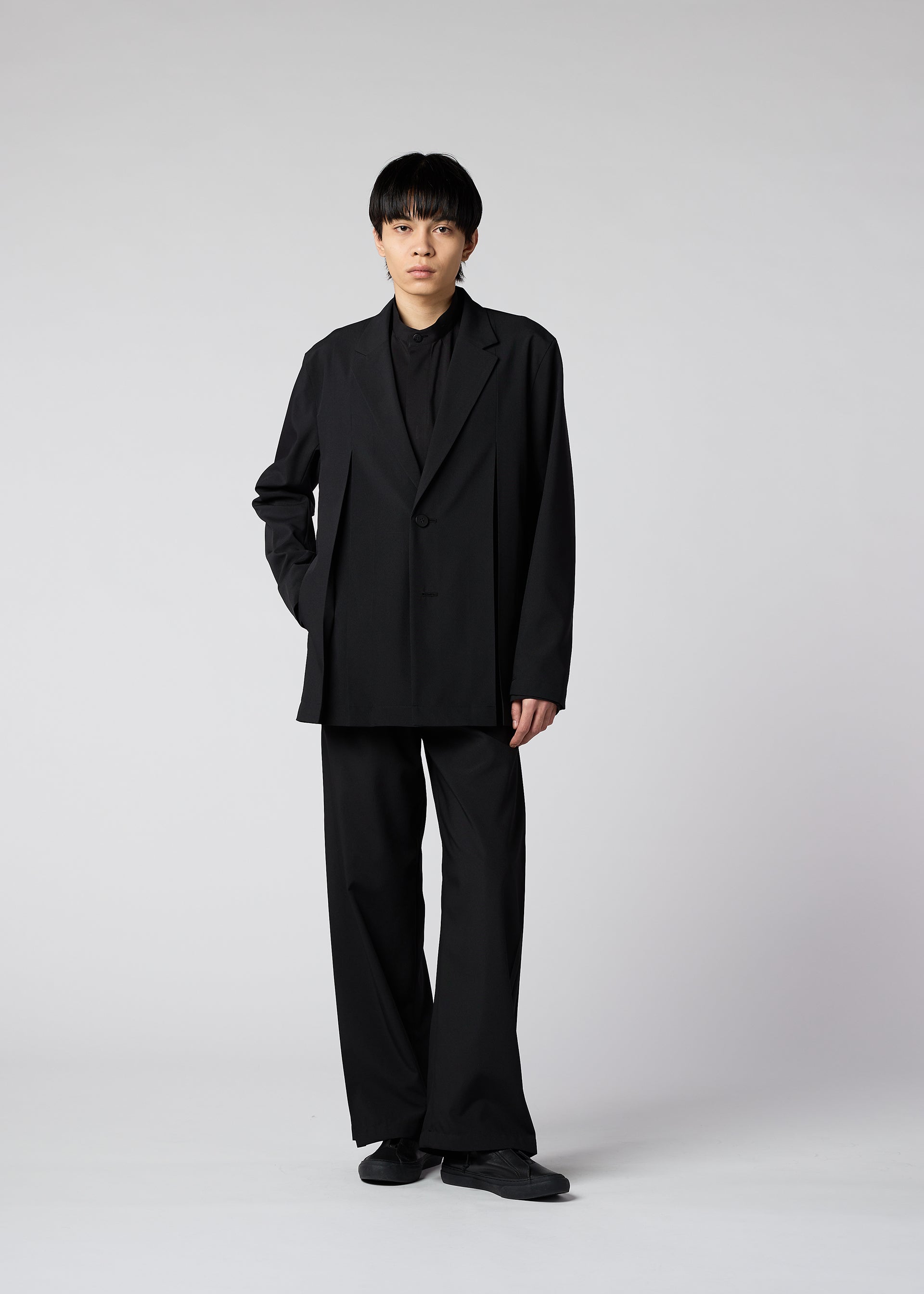 A model wears the IM Men WINGS jacket.