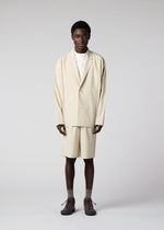 A model wears the IM Men FLAT jacket.