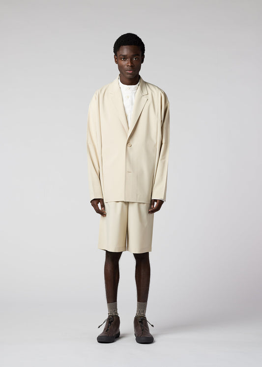 A model wears the IM Men FLAT jacket.