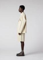 A model wears the IM Men FLAT jacket.