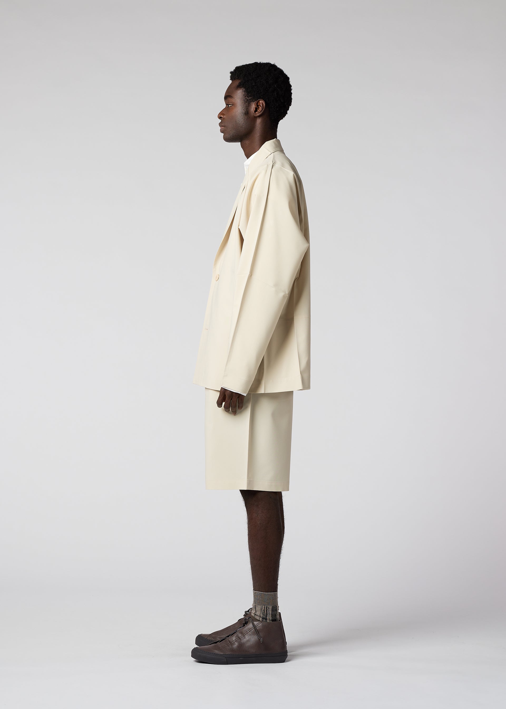 A model wears the IM Men FLAT jacket.