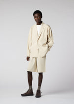 A model wears the IM Men FLAT jacket.