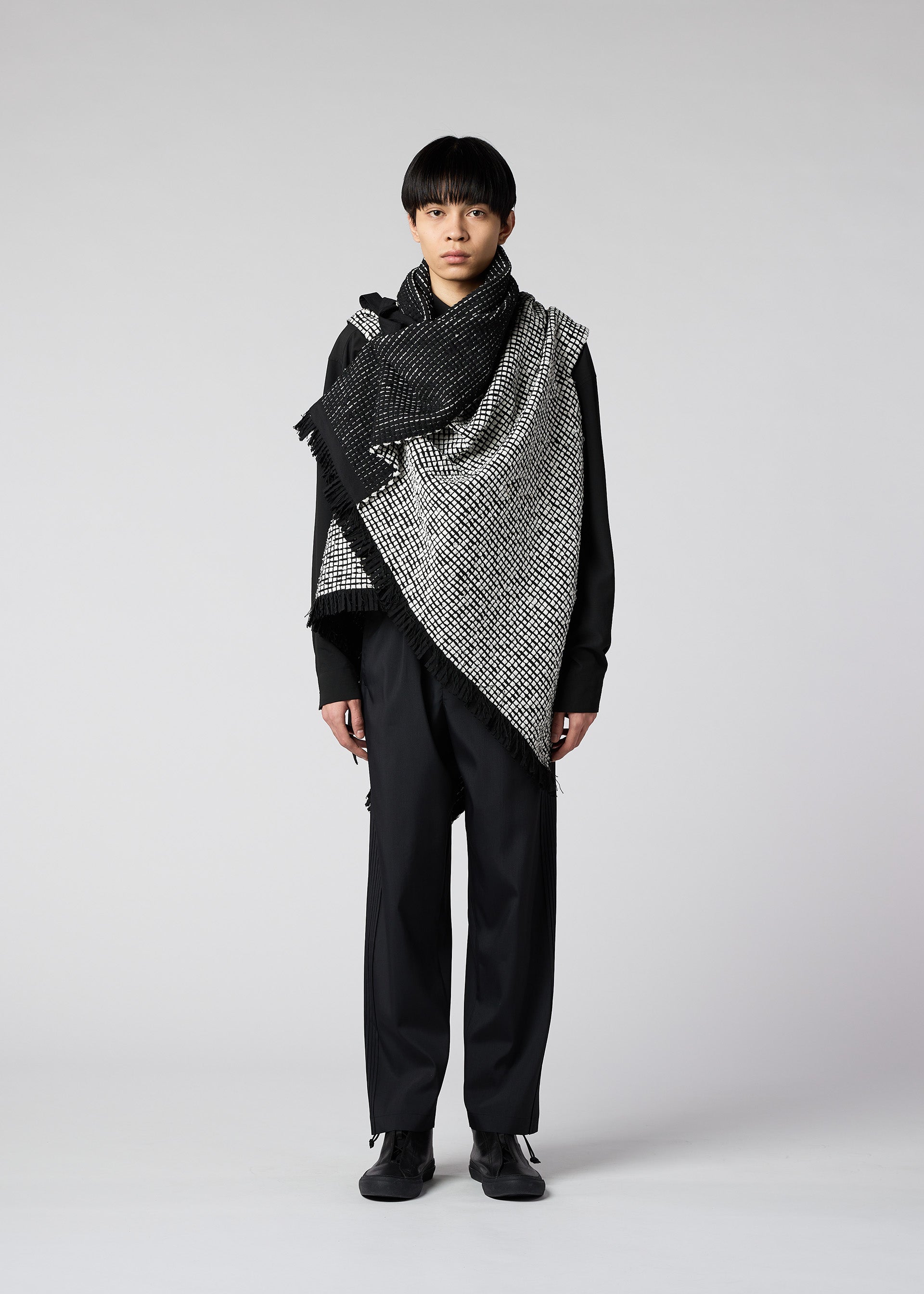 A model wears the IM Men SAKIORI vest.