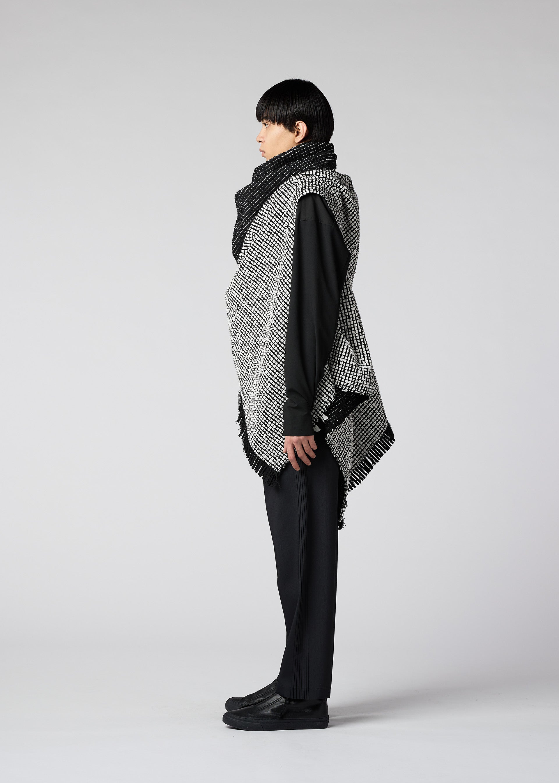 A model wears the IM Men SAKIORI vest.