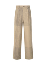 A product shot of the IM MEN KASURI trousers in beige (41).