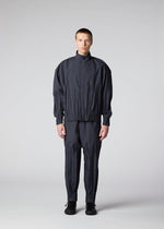 A model wears the IM MEN WAFT trousers.