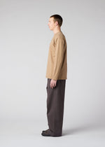 A model wears the IM Men TOUGH COTTON trousers.