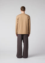 A model wears the IM Men TOUGH COTTON trousers.