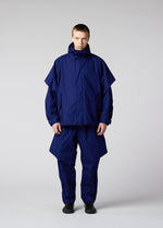 A model wears the IM Men LIGHT COTTON trousers.